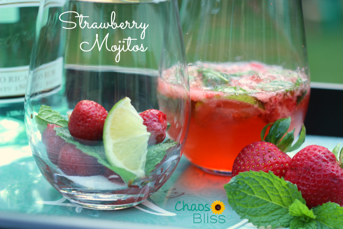 There could not possibly be a more refreshing summer adult beverage than a ice cold Strawberry Mojito, made with freshly picked strawberries and homegrown mint.