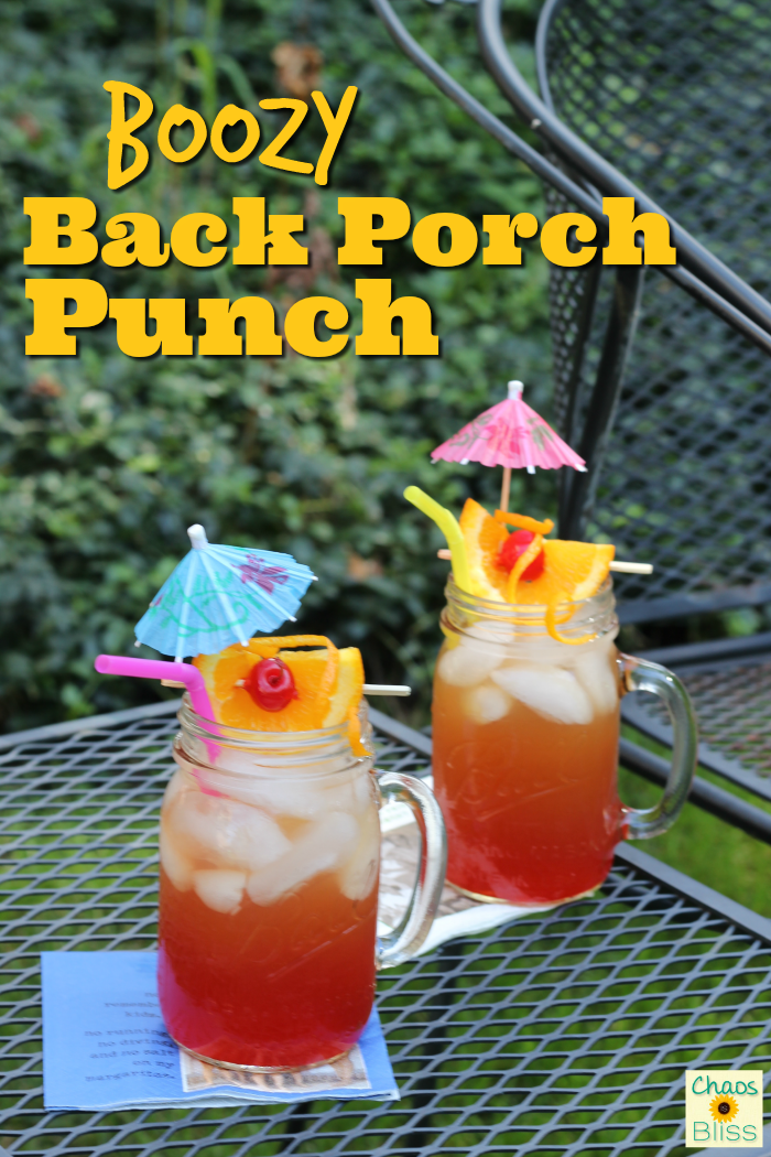 Take that sweet tea up a notch with this Boozy Back Porch Punch, a delicious late summer honey whiskey drink.