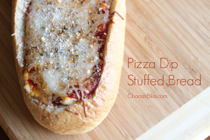 Next time you need a party appetizer, try Pizza Dip Stuffed Bread! Savory and very filling appetizer recipe.