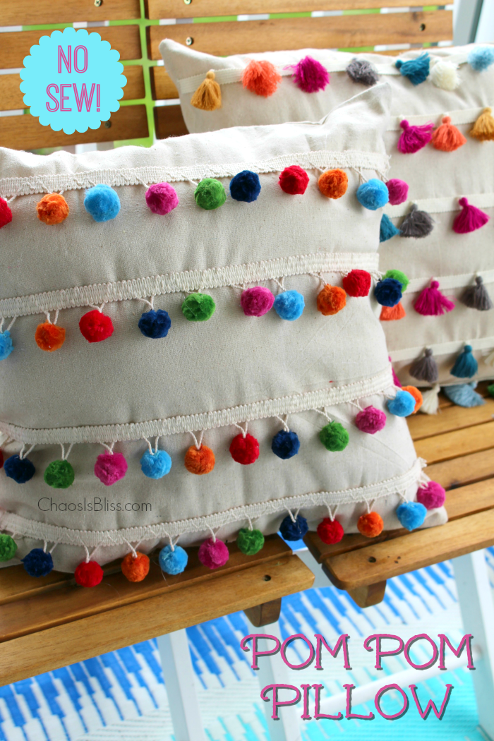 You won't believe how easy it is to make this DIY No Sew Pom Pom Pillow!