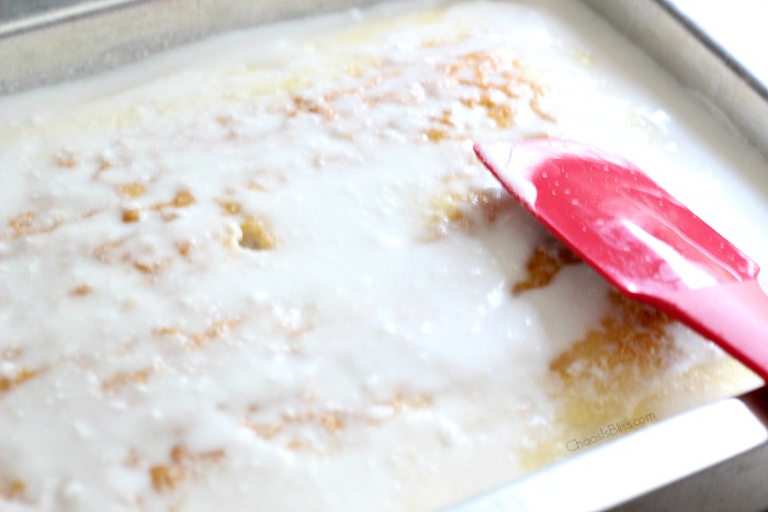 Light, moist and easy to make, this Coconut Cake poke cake recipe will be a favorite twist on a box cake mix recipe you'll savor all through the year!