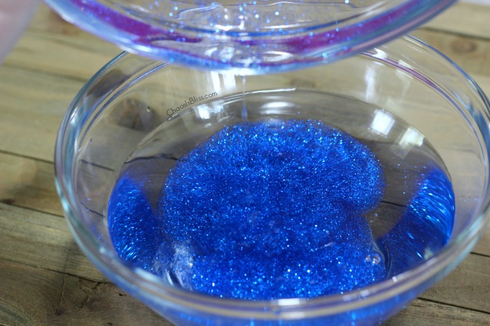 Here's a fun DIY Earth Day or Earth-inspired slime you can make with your kids, with bold colors and lots and lots of GLITTER!