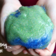 Here's a fun DIY Earth Day slime you can make with your kids, with bold earth-inspired colors and lots and lots of GLITTER!