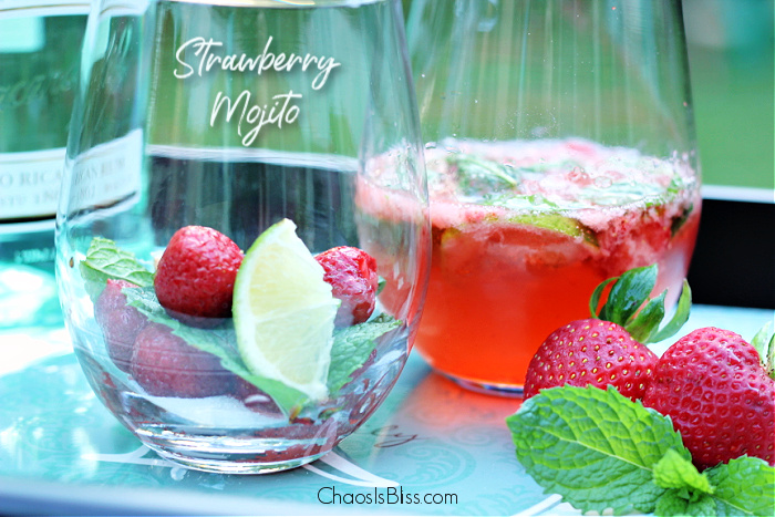 There could not possibly be a more refreshing summer adult beverage than an ice cold Strawberry Mojito, made with freshly picked strawberries and homegrown mint.